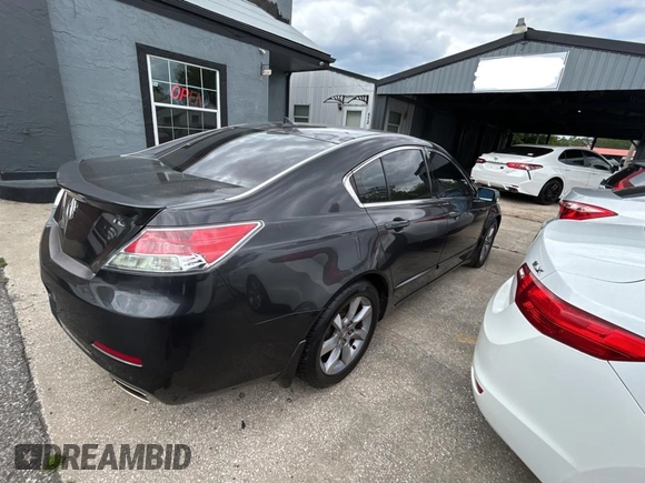 2012 Acura TL Tech Auto with VIN 19UUA8F51CA038207, listed as a Copart auction lot 52822055 with 149,409 mi miles and Clean Title. Bid and sale history available at carsss.com. Image 4.