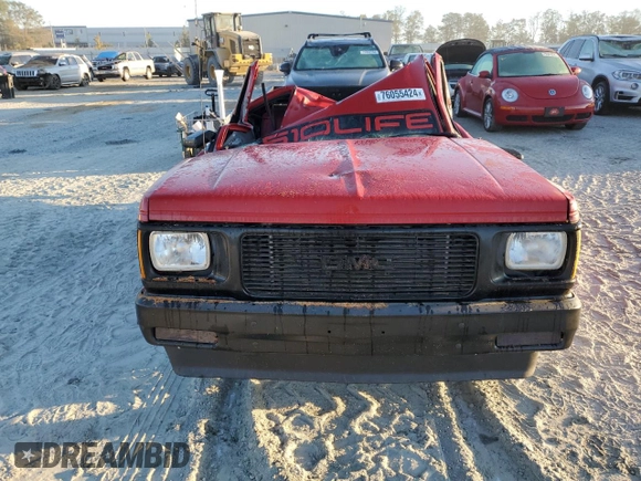 1992 GMC Sonoma with VIN 1GTCS14R2N8519033, listed as a Copart auction lot 76055424 with Not Provided miles and Salvage Title. Bid and sale history available at DreamBid. Image 5.