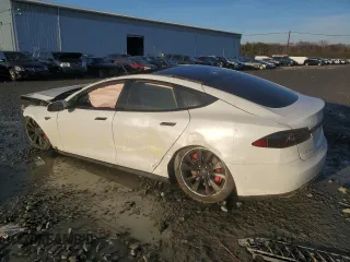 2016 Tesla Model S 90D z VIN 5YJSA1E29GF128397, wystawiony jako Copart lot #86532184 z przebiegiem Nie podano mil oraz Szkoda całkowita • Salvage title. Historia ofert i sprzedaży dostępna na DreamBid. Obrazek 2.