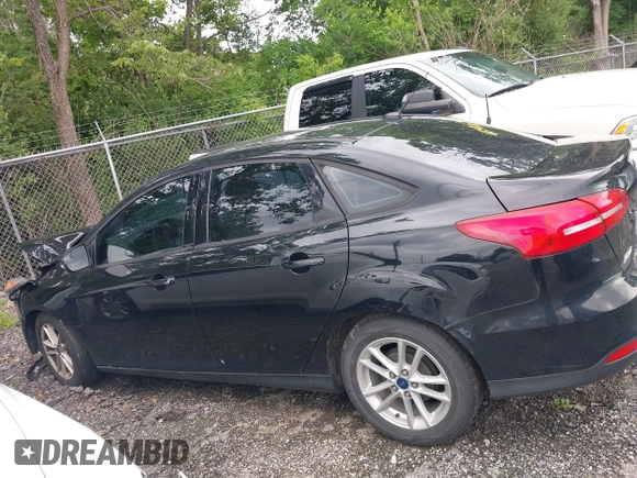 2018 Ford Focus SE with VIN 1FADP3F24JL248653, listed as a IAAI auction lot 42416377 with 113,856 mi miles and . Bid and sale history available at DreamBid. Image 14.