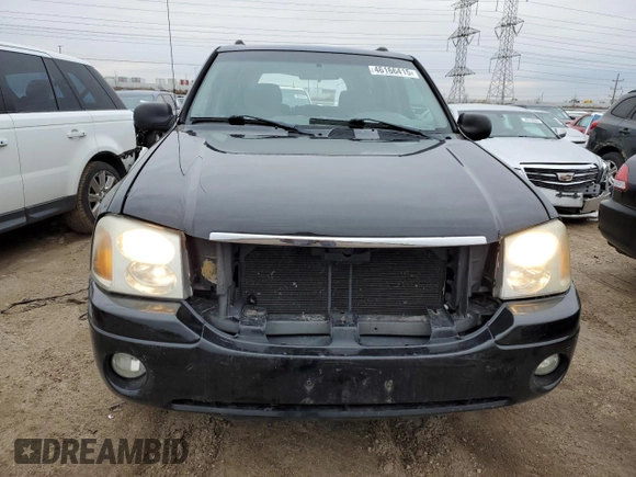 2003 GMC Envoy SLE with VIN 1GKDT13S532122751, listed as a Copart auction lot 46166415 with 139,621 mi miles and Salvage Title. Bid and sale history available at carsss.com. Image 5.