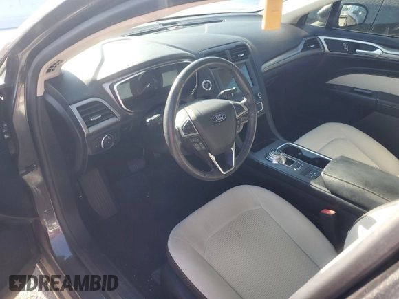 2020 Ford Fusion SE z VIN 3FA6P0HD6LR189762, wystawiony jako IAAI lot #42780149 z przebiegiem 51 099 mil mil oraz . Historia ofert i sprzedaży dostępna na DreamBid. Obrazek 7.