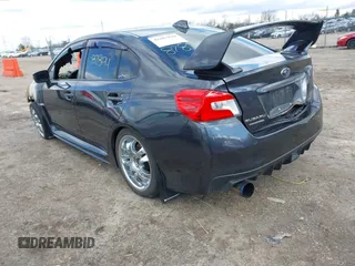 2016 Subaru WRX STI Limited with VIN JF1VA2Y61G9803886, listed as a IAAI auction lot 41687894 with Not Provided miles and . Bid and sale history available at DreamBid. Image 3.