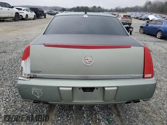 2006 Cadillac DTS 1SD z VIN 1G6KD57YX6U193025, wystawiony jako Copart lot #45784605 z przebiegiem Nie podano mil oraz Szkody całkowita. Historia ofert i sprzedaży dostępna na DreamBid. Obrazek 6.