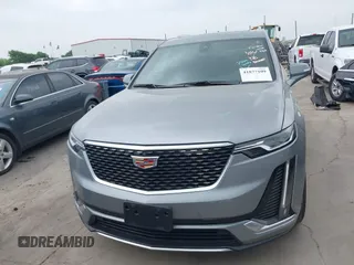 2025 Cadillac XT6 FWD Premium Luxury with VIN 1GYKPCRS4SZ119978, listed as a IAAI auction lot 41877109 with 13,579 mi miles. Bid and sale history available at carsss.com. Image 12.