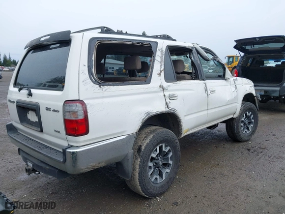 1999 Toyota 4Runner SR5 with VIN JT3HN86R1X0225292, listed as a IAAI auction lot 41848716 with 304,978 mi miles. Bid and sale history available at carsss.com. Image 4.