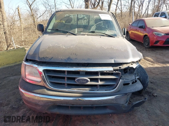 2003 Ford F-150 XL with VIN 2FTRX18WX3CB01433, listed as a IAAI auction lot 41768388 with 170,357 mi miles. Bid and sale history available at carsss.com. Image 12.