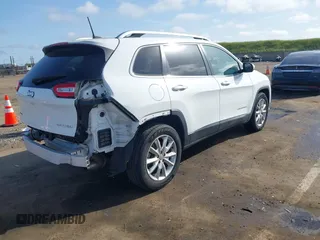 2016 Jeep Cherokee Limited with VIN 1C4PJMDS4GW310495, listed as a IAAI auction lot 41978324 with 70,182 mi miles. Bid and sale history available at carsss.com. Image 4.