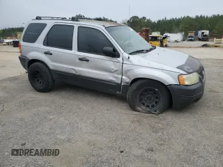 2003 Ford Escape XLS Popular with VIN 1FMYU02173KB43156, listed as a Copart auction lot 51534495 with 266,600 mi miles and Salvage title. Bid and sale history available at DreamBid. Image 4.