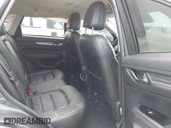 2021 Mazda CX-5 Grand Touring with VIN JM3KFBDM2M0431484, listed as a IAAI auction lot 42547665 with 34,757 mi miles and . Bid and sale history available at DreamBid. Image 8.
