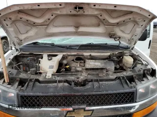 2017 Chevrolet Express Passenger LT z VIN 1GAZGPFF7H1225215, wystawiony jako Copart lot #47135935 z przebiegiem 161 084 mil mil oraz Szkoda całkowita • Salvage title. Historia ofert i sprzedaży dostępna na DreamBid. Obrazek 12.