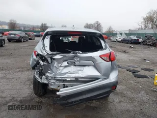 2016 Mazda CX-5 Grand Touring with VIN JM3KE4DY4G0712465, listed as a IAAI auction lot 41859217 with 61,806 mi miles and . Bid and sale history available at carsss.com. Image 6.