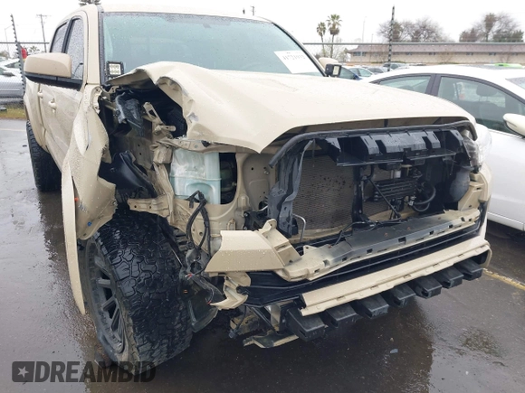 2016 Toyota Tacoma SR5 with VIN 3TMDZ5BN3GM003351, listed as a IAAI auction lot 41721932 with 100,774 mi miles and . Bid and sale history available at DreamBid. Image 6.