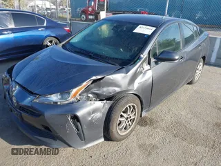 2022 Toyota Prius L Eco with VIN JTDKAMFUXN3188930, listed as a IAAI auction lot 42275661 with 116,934 mi miles and . Bid and sale history available at DreamBid. Image 2.