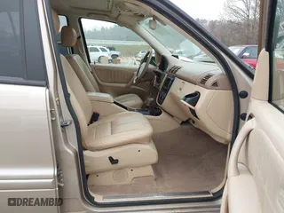 2002 Mercedes-Benz M-Class with VIN 4JGAB54E82A308902, listed as a IAAI auction lot 41779482 with 99,933 mi miles. Bid and sale history available at carsss.com. Image 5.