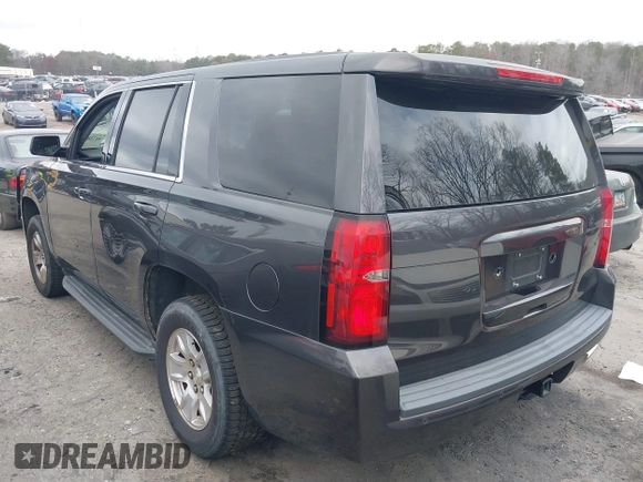 2017 Chevrolet Tahoe Commercial with VIN 1GNLCDEC0HR303602, listed as a IAAI auction lot 41718630 with 196,484 mi miles and . Bid and sale history available at DreamBid. Image 3.