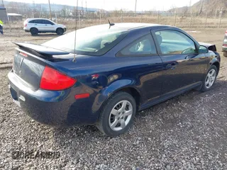 2009 Pontiac G5 with VIN 1G2AS18H797276991, listed as a IAAI auction lot 41855397 with 131,376 mi miles. Bid and sale history available at carsss.com. Image 4.