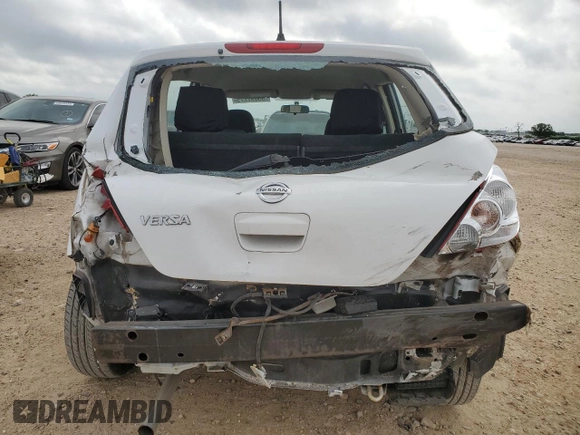 2011 Nissan Versa S с VIN 3N1BC1CP8BL477377, выставлен на аукционе Copart как лот 55097775 с пробегом 120 225 миль миль и Списание • Salvage title. История ставок и продаж доступна на DreamBid. Изображение 6.