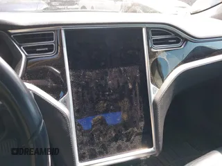 2015 Tesla Model S 85D with VIN 5YJSA1H2XFF084145, listed as a IAAI auction lot 42101755 with 105,660 mi miles. Bid and sale history available at carsss.com. Image 18.