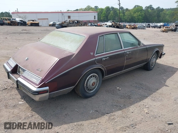 1985 Cadillac Seville z VIN 1G6KS6989FE821515, wystawiony jako IAAI lot #42009508 z przebiegiem 13 600 mil mil oraz . Historia ofert i sprzedaży dostępna na DreamBid. Obrazek 4.