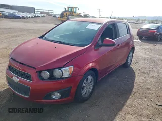 2013 Chevrolet Sonic LT with VIN 1G1JC6SB9D4113711, listed as a IAAI auction lot 41823182 with 116,711 mi miles. Bid and sale history available at carsss.com. Image 2.