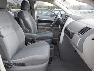 2010 Dodge Grand Caravan SXT with VIN 2D4RN5D18AR218903, listed as a IAAI auction lot 41560484 with Not Provided miles and . Bid and sale history available at DreamBid. Image 5.