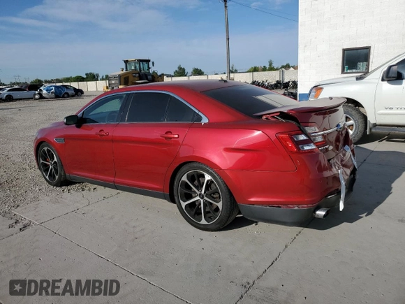 2014 Ford Taurus SHO with VIN 1FAHP2KT9EG115170, listed as a Copart auction lot 61203645 with 106,740 mi miles and Salvage title. Bid and sale history available at DreamBid. Image 2.