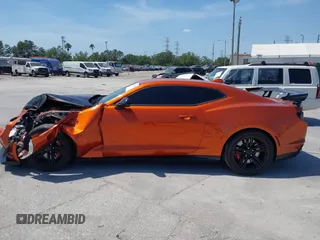 2023 Chevrolet Camaro ZL1 z VIN 1G1FK1R69P0104359, wystawiony jako IAAI lot #42124070 z przebiegiem 20 934 mil mil oraz . Historia ofert i sprzedaży dostępna na DreamBid. Obrazek 14.