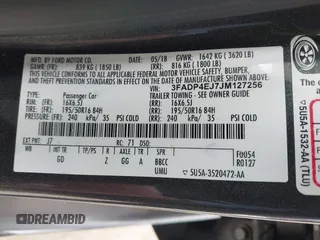 2018 Ford Fiesta SE with VIN 3FADP4EJ7JM127256, listed as a IAAI auction lot 41938121 with 83,211 mi miles. Bid and sale history available at carsss.com. Image 9.
