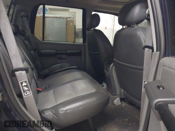 2003 Ford Explorer Sport Trac XLS z VIN 1FMDU77E03UC07089, wystawiony jako IAAI lot #41938966 z przebiegiem 128 982 mil mil oraz . Historia ofert i sprzedaży dostępna na DreamBid. Obrazek 8.