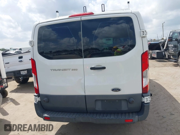 2015 Ford Transit Cargo with VIN 1FTYR2ZM2FKA86869, listed as a IAAI auction lot 42635477 with 14,695 mi miles and . Bid and sale history available at DreamBid. Image 16.