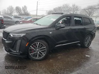 2022 Cadillac XT6 Sport with VIN 1GYKPHRS4NZ170950, listed as a Copart auction lot 87334774 with 82,808 mi miles and Salvage Title. Bid and sale history available at carsss.com. Image 1.