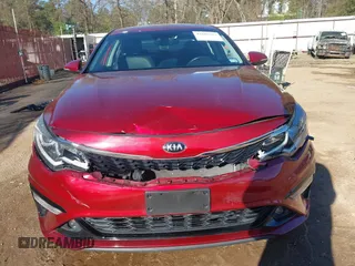 2019 Kia Optima LX z VIN 5XXGT4L3XKG366522, wystawiony jako IAAI lot #41805592 z przebiegiem 65 859 mil mil oraz . Historia ofert i sprzedaży dostępna na DreamBid. Obrazek 13.