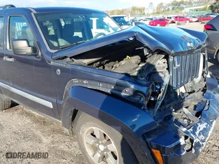 2008 Jeep Liberty Sport with VIN 1J8GN28K08W278092, listed as a IAAI auction lot 41215325 with 127,581 mi miles. Bid and sale history available at carsss.com. Image 12.