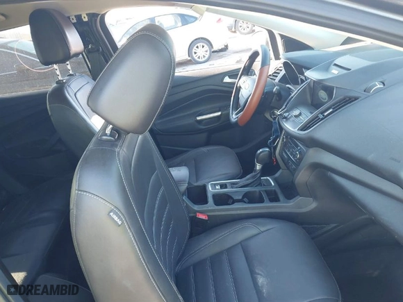 2017 Ford Escape SE with VIN 1FMCU0GD9HUB38906, listed as a IAAI auction lot 41772488 with 108,259 mi miles. Bid and sale history available at carsss.com. Image 5.