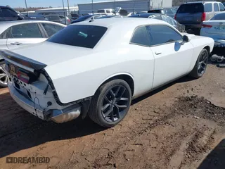 2021 Dodge Challenger SXT with VIN 2C3CDZAG1MH560522, listed as a IAAI auction lot 41709759 with 32,384 mi miles. Bid and sale history available at carsss.com. Image 4.