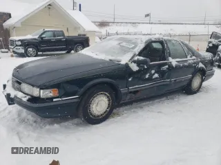 1993 Cadillac Seville z VIN 1G6KS52B9PU819691, wystawiony jako Copart lot #41598595 z przebiegiem 251 791 mil mil oraz Szkody całkowita. Historia ofert i sprzedaży dostępna na DreamBid. Obrazek 1.
