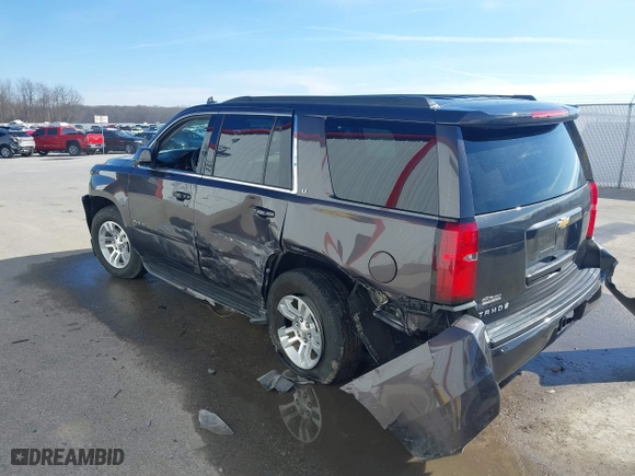 2018 Chevrolet Tahoe LT with VIN 1GNSKBKC4JR261190, listed as a IAAI auction lot 41548734 with 142,800 mi miles. Bid and sale history available at carsss.com. Image 3.