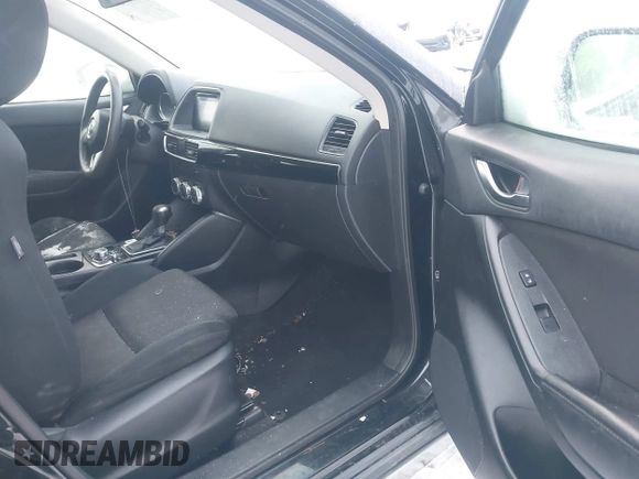 2016 Mazda CX-5 Sport z VIN JM3KE4BY0G0919017, wystawiony jako IAAI lot #41316161 z przebiegiem 209 259 mil mil oraz . Historia ofert i sprzedaży dostępna na DreamBid. Obrazek 5.