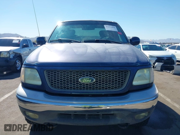 2003 Ford F-150 XL with VIN 1FTRX18WX3NA22323, listed as a IAAI auction lot 41635869 with 129,029 mi miles. Bid and sale history available at carsss.com. Image 12.