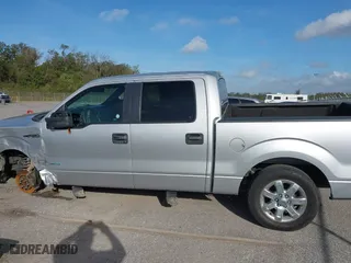 2013 Ford F-150 XL with VIN 1FTFW1CT9DKD02756, listed as a IAAI auction lot 40759592 with 218,975 mi miles. Bid and sale history available at carsss.com. Image 14.