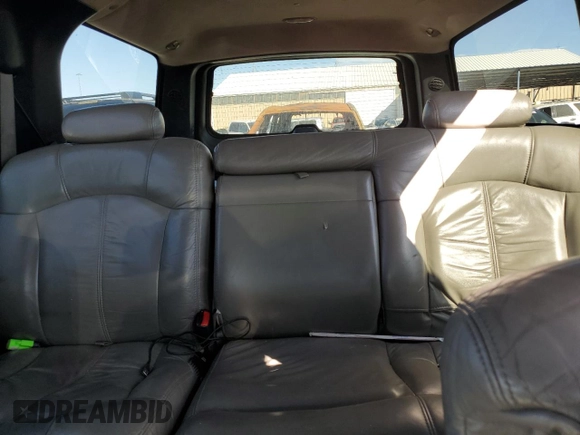2002 Chevrolet Suburban LS with VIN 3GNFK16Z12G273440, listed as a Copart auction lot 72806534 with 214,158 mi miles and Salvage Title. Bid and sale history available at carsss.com. Image 10.