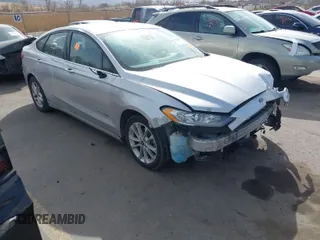 2019 Ford Fusion Hybrid SE with VIN 3FA6P0LU5KR140266, listed as a IAAI auction lot 41703313 with 1 mi miles. Bid and sale history available at carsss.com. Image 1.