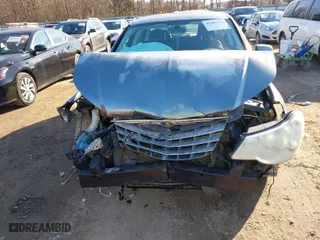 2010 Chrysler Sebring Limited with VIN 1C3CC5FV0AN127697, listed as a IAAI auction lot 41305154 with 168,724 mi miles. Bid and sale history available at carsss.com. Image 6.