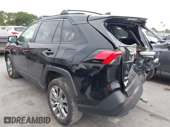 2022 Toyota RAV4 XLE Premium with VIN JTMC1RFV0ND085813, listed as a IAAI auction lot 42152401 with 86,707 mi miles and . Bid and sale history available at DreamBid. Image 3.