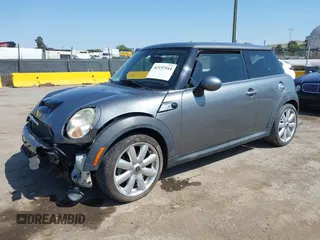 2007 MINI Hardtop S with VIN WMWMF73597TL86892, listed as a IAAI auction lot 42157544 with 93,097 mi miles and . Bid and sale history available at DreamBid. Image 2.