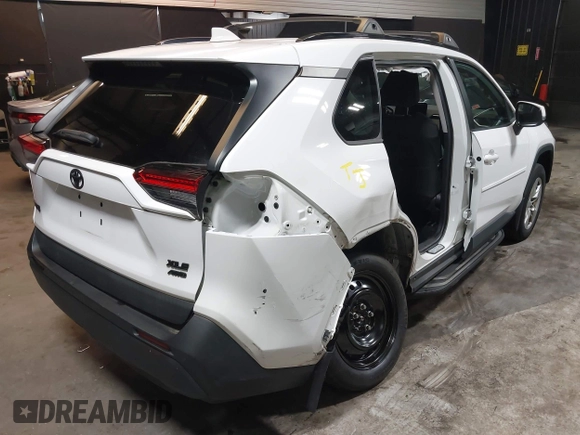 2021 Toyota RAV4 XLE with VIN 2T3P1RFV3MC166504, listed as a IAAI auction lot 42600429 with 63,193 mi miles and . Bid and sale history available at DreamBid. Image 4.