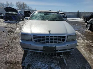 1999 Cadillac DeVille z VIN 1G6KD54Y5XU774986, wystawiony jako Copart lot #50167955 z przebiegiem 151 375 mil mil oraz Czysty tytuł • Clean title. Historia ofert i sprzedaży dostępna na DreamBid. Obrazek 5.