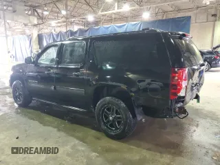 2012 Chevrolet Suburban LT with VIN 1GNSKJE7XCR327124, listed as a Copart auction lot 51016235 with 241,689 mi miles and Clean Title. Bid and sale history available at carsss.com. Image 2.