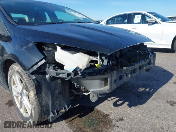 2015 Ford Focus SE with VIN 1FADP3F21FL385654, listed as a IAAI auction lot 42306171 with 187,725 mi miles and . Bid and sale history available at DreamBid. Image 6.